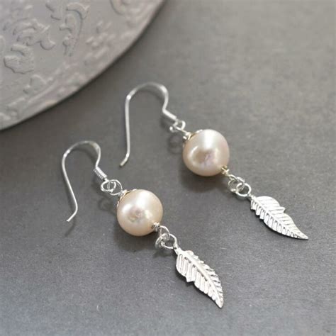 Sterling Silver Pearl And Feather Dangly Earrings Affordable Martha