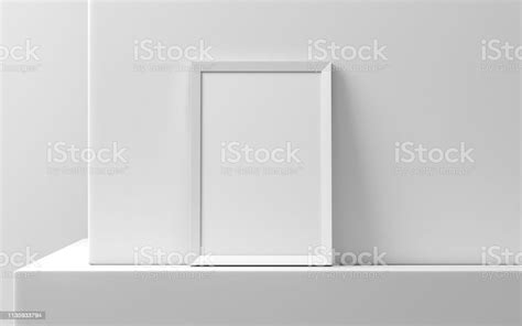 Wide Wooden Frame With Poster Mockup Standing Against White Wall Stock