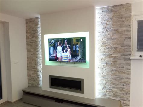 TV wall with stone facing | Living room decor fireplace, Home fireplace, Living room design modern