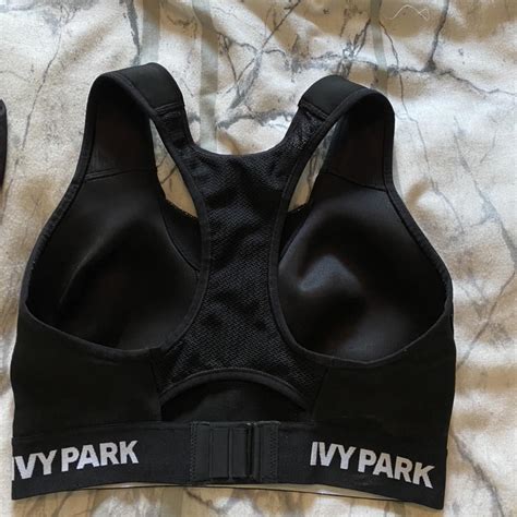 Ivy park black sports bra size XS. AMAZING CONDITION... - Depop