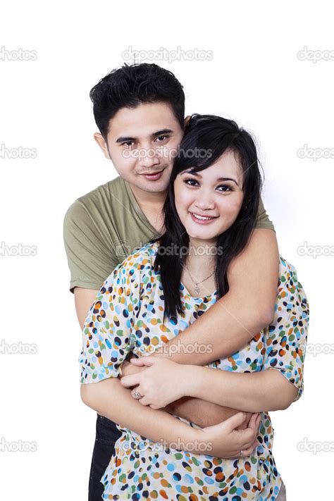 Happy Couple Embracing On White Background — Stock Photo © Realinemedia