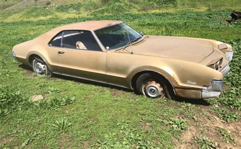 FWD Luxury Muscle 1966 Oldsmobile Toronado Barn Finds