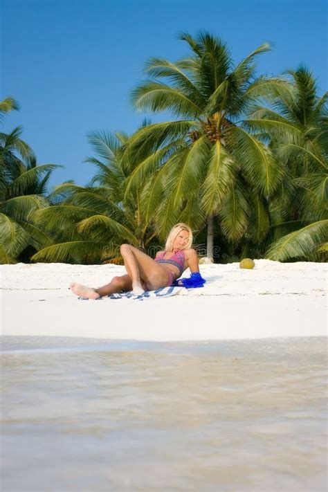Beautiful Brunette Is Lying On A White Beach Stock Photo Image Of Healthy Lifestyle