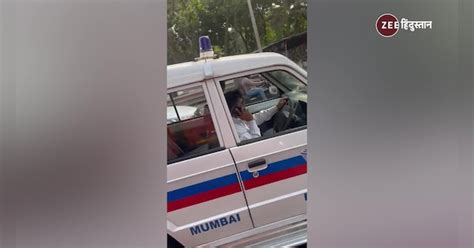 Mumbai Police Officer Break Traffic Rule Is Seen Talking On Phone While