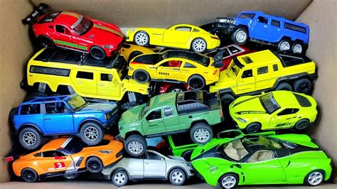 Box Full Of Model Cars Lamborghini Mclaren Lexus Lm H Porsche