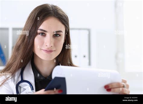 Beautiful Smiling Female Doctor Hold Clipboard Stock Photo Alamy