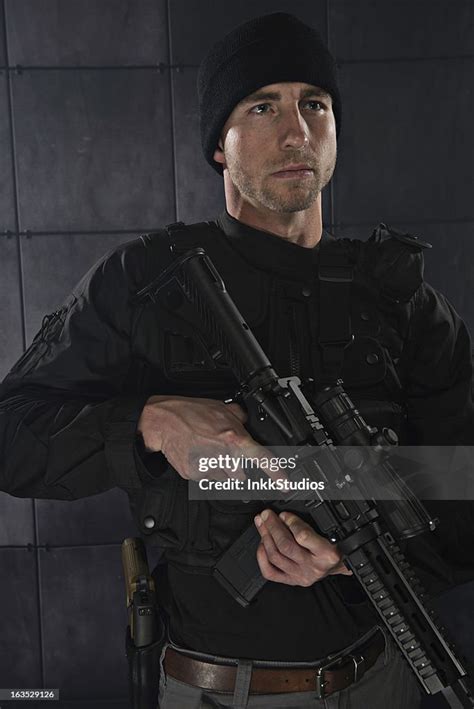 Tactical Team Member High-Res Stock Photo - Getty Images