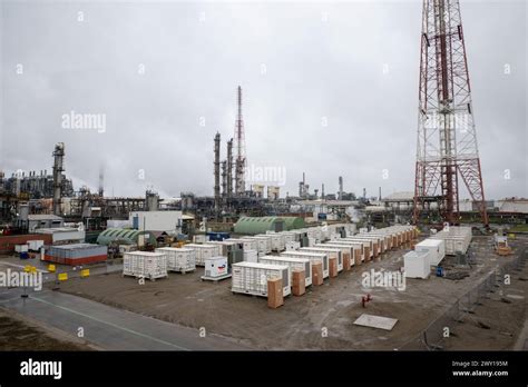 Containers containing batteries are pictured during a press conference ...