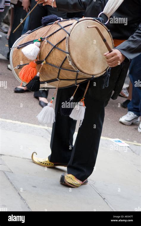 Dhol Indian Drum playing bhangra beats music Stock Photo - Alamy