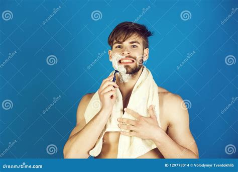 Macho Smiling With Naked Torso Shaving Beard With Safety Razor Stock Photo Image Of Beauty