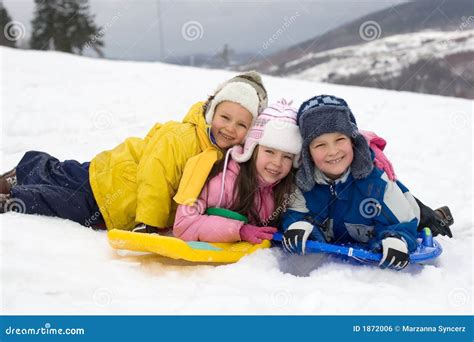 Kids Sliding In Fresh Snow Stock Photo Image Of Friendly 1872006