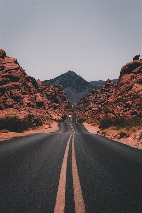 Car On Road In Between Rocky Mountain Landscape Rocks Road Car Hd