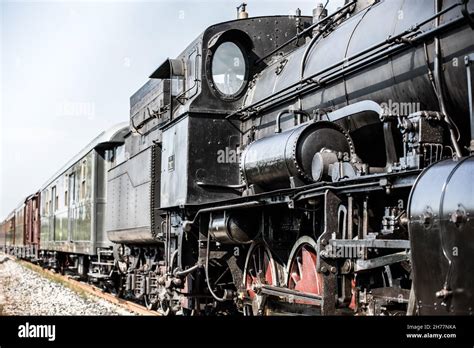 A steam train at a station Stock Photo - Alamy