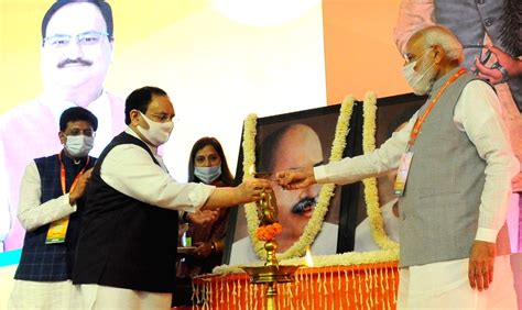 New Delhiprime Minister Narendra Modi Lighting The Lamp At Bjp National Executive Meeting In