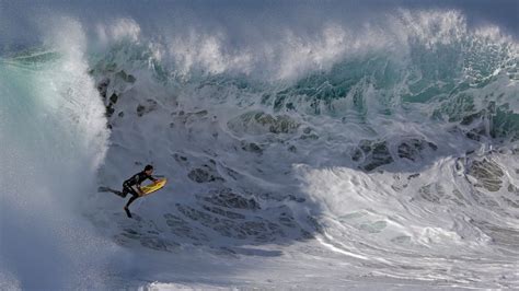 See What Its Like To Surf The Wedge Californias Monster Waves