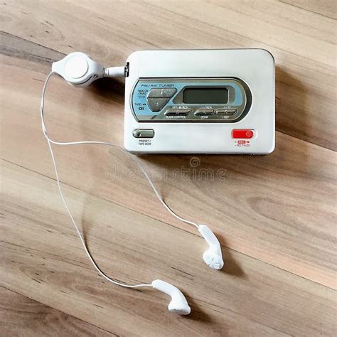 Audio Tape Player with Headphones, Gray, Lies on Wooden Background ...