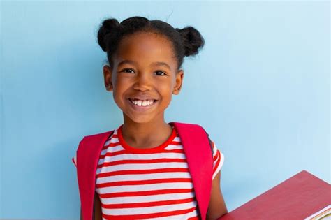 Premium Photo Portrait Of Happy African American Schoolgirl With