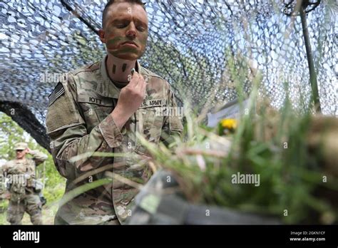 Staff Sgt Iott 59th Signal Battalion Applies Face Paint June 2 At