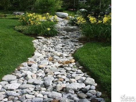 Dry Creek Beds And Their Benefits Dry Riverbed Landscaping River Rock