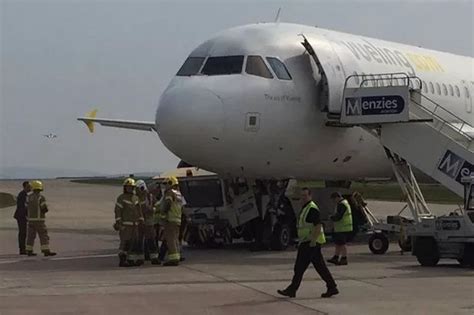 Passenger Plane Has Collapsed Onto A Tow Truck At Manchester Airport