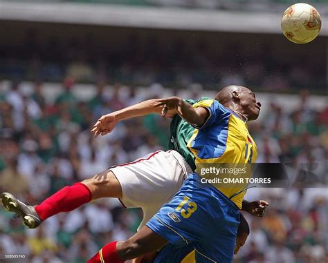Jared Borgetti Of Mexico Hits A Header With Arley Dinas Of Colombia