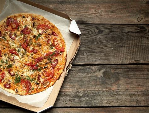 Baked Round Pizza With Smoked Sausages Mushrooms Tomatoes Cheese And