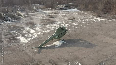 A Broken Fuselage Of A Soviet Mi Helicopter Without A Propeller At An