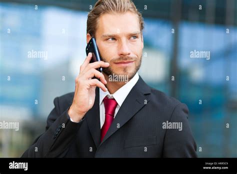 Handsome Man Talking At The Phone Outdoor Stock Photo Alamy