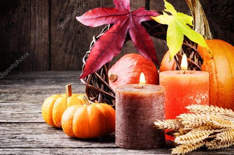 Autumn Still Life With Pumpkins And Candles Stock Photo Paulgrecaud