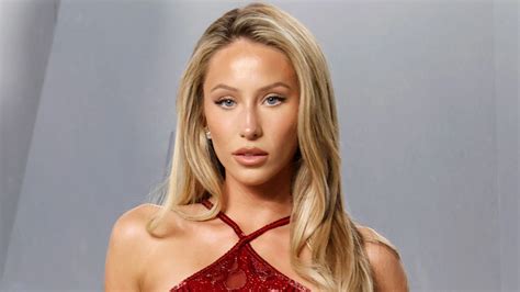 Alix Earle Strikes A Pose In Nude Outfit Held Up By Only Strings