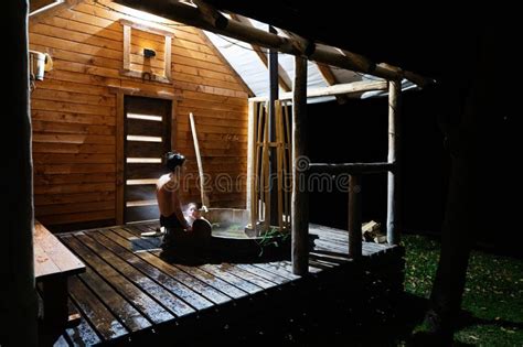 Relaxing In A Wooden Outdoor Hot Tub At Night Stock Image Image Of Escape Serene