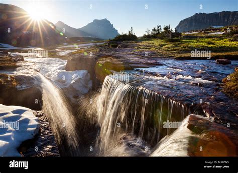 Mt00132 00 Montana Early Season Waterfalls At Logan Pass In Glacier National Park Stock