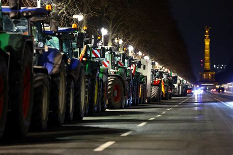 German Farmers Block Highway Access Roads To Protest Subsidy Cuts