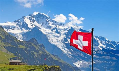 Matterhorn with Swiss flag — Stock Photo © vencav #8123579