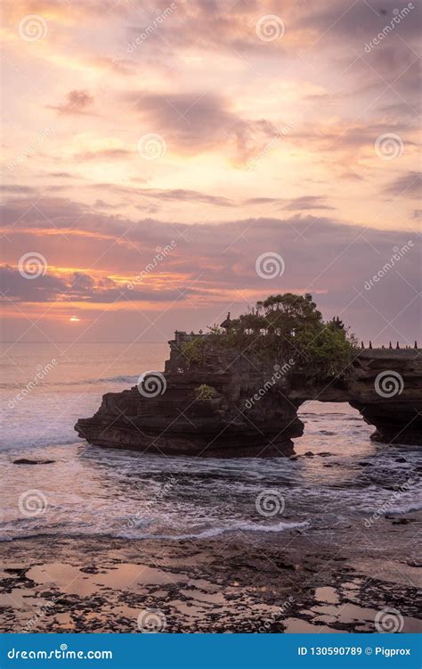 Sunset At Pura Batu Bolong Temple On The Beatiful Rock In Bali Stock