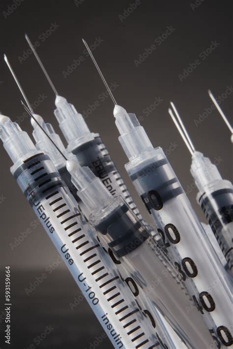 Clustered single use insulin syringes Stock Photo | Adobe Stock