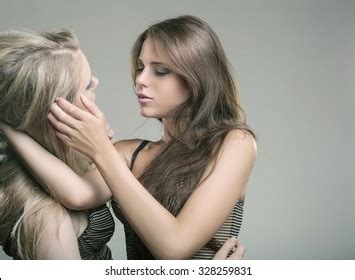 Two Beautiful Sexy Lesbian Women In Erotic Foreplay Stock Photos