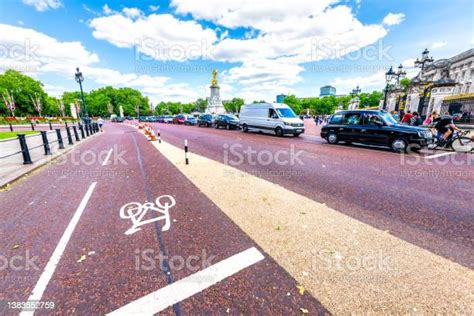 Road Roundabout With Bicycle Lane At Buckingham Palace With Victoria