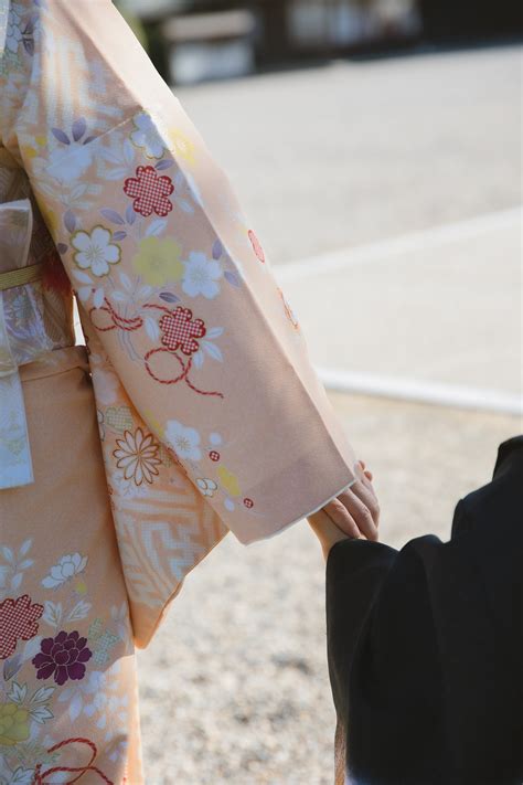 Woman in traditional orange kimono · Free Stock Photo