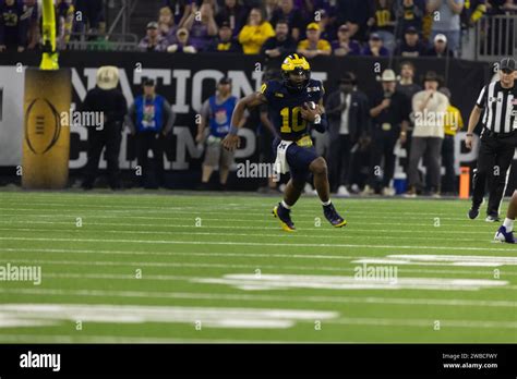 Michigan Wolverines Quarterback Alex Orji Runs In The Open Field