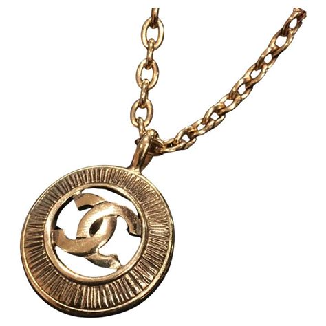 Vintage Chanel Logo Necklace at 1stDibs