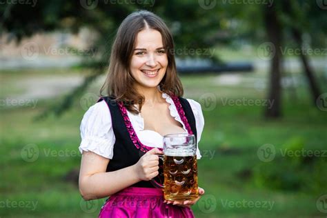 Sexy Russian Woman In Bavarian Dress Holding Beer Mugs 9321361 Stock