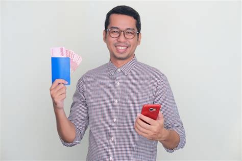 Premium Photo Adult Asian Man Smiling Happy While Holding His Saving