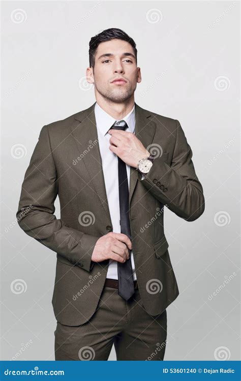 Man Adjusting Tie Stock Photo Image Of Work Suit Grab