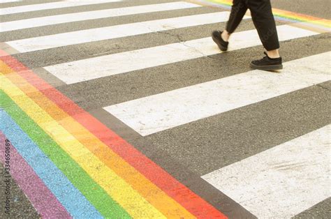 Gay Pride Month Lgbt Rainbow On The Pedestrian Path Asfalt On The Street Summer Day A Person