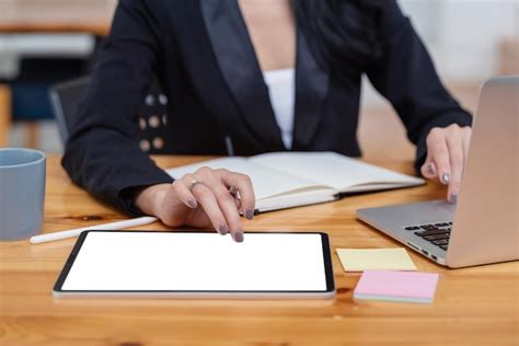 Premium Photo Close Up Of Businesswoman Holding Pen Working Using