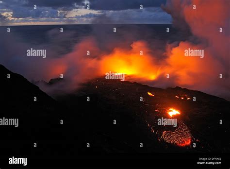 River Of Molten Lava Flowing To The Sea At Sunrise Kilauea Volcano