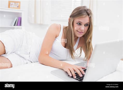 Blonde Woman Typing On The Laptop Stock Photo Alamy