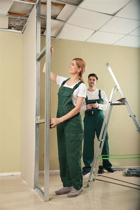 Workers Installing Drywall Home Repair Service Stock Image Image Of