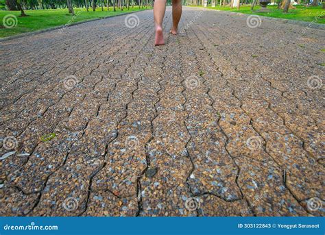 Man Walking on the Road Barefoot in the Park Stock Image - Image of ...